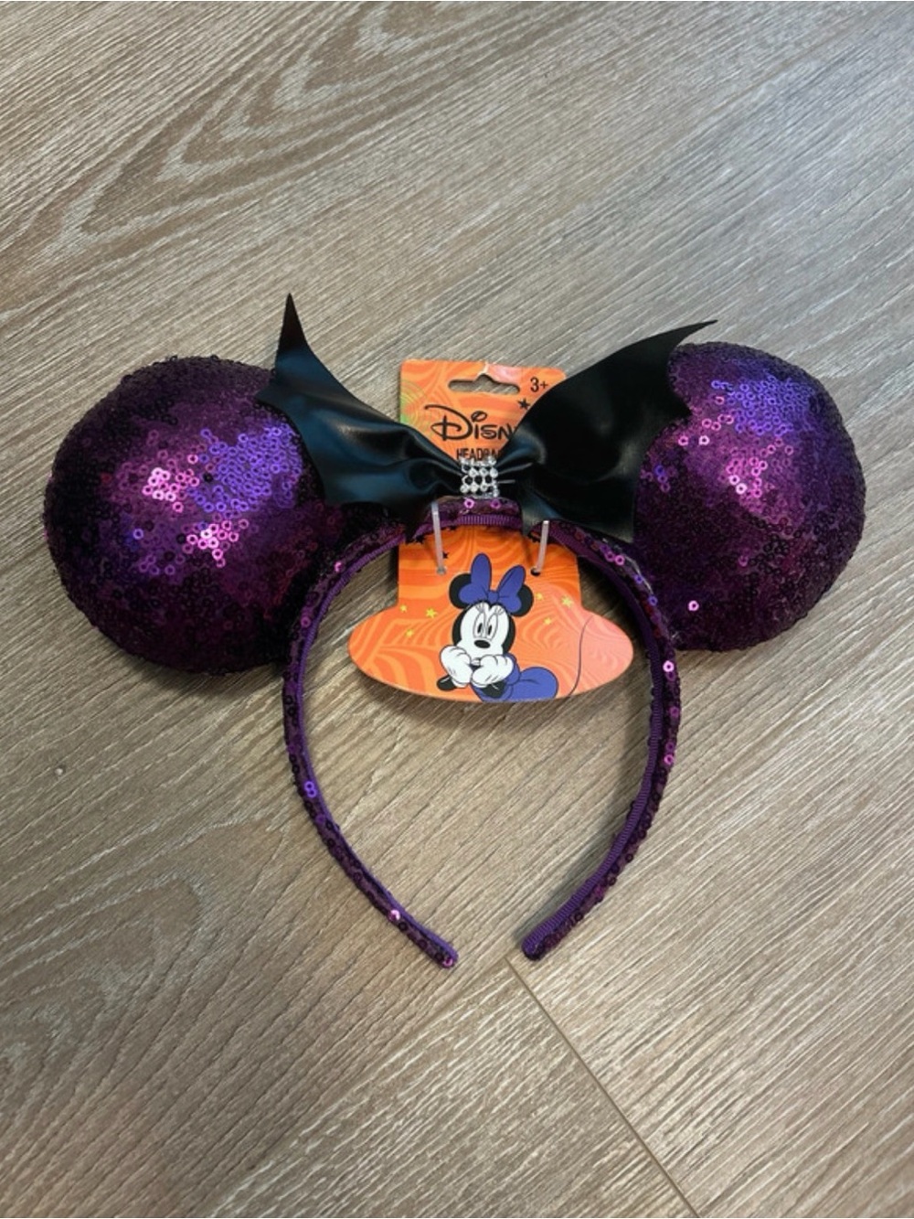 Disney Purple Sequin Minnie Ears Headband with Black Bow